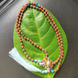 <transcy>"The strongest amulet" The strongest amulet that combines a gamelan ball and a Rudraksha necklace.</transcy>